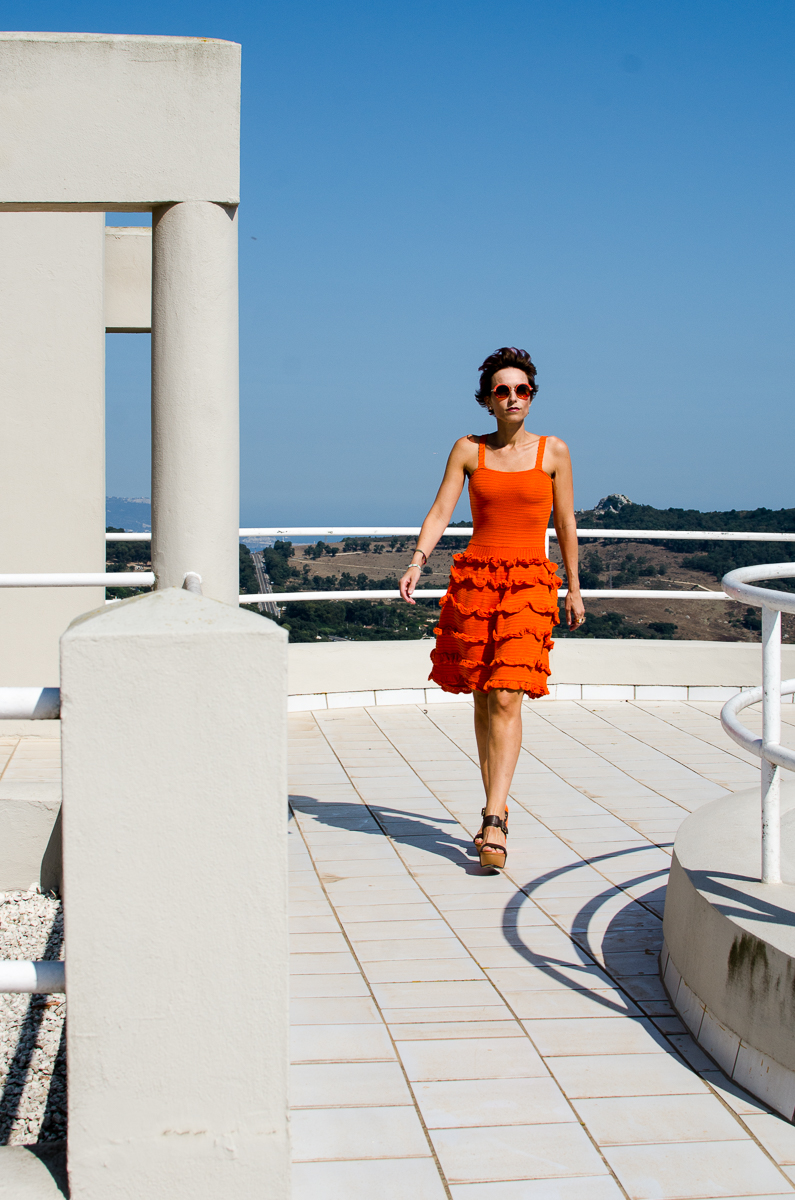 Cristina with Orange Dress