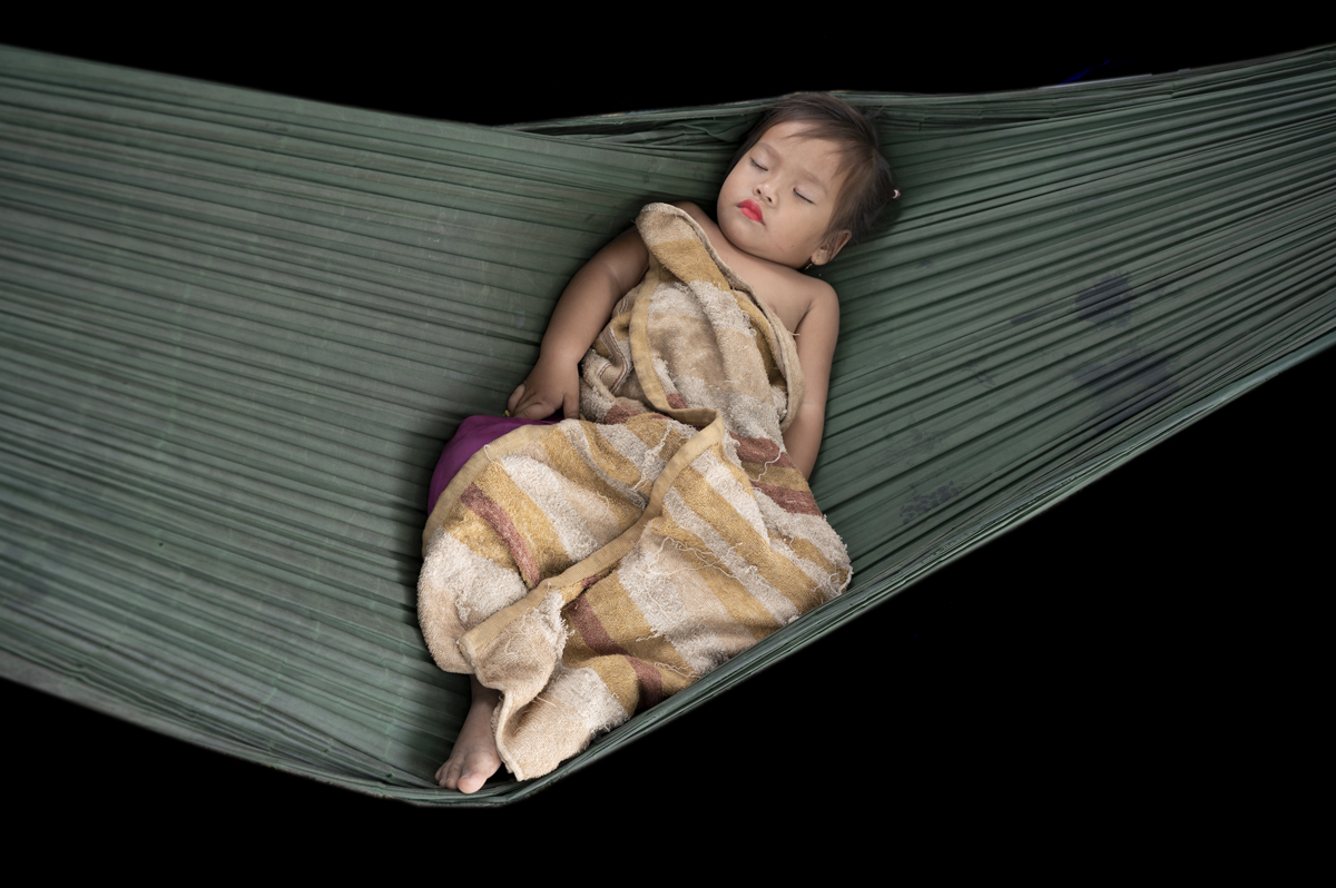 Sleeping girl in hammock