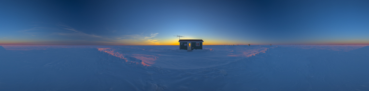 Ice Fishing House at Sunset