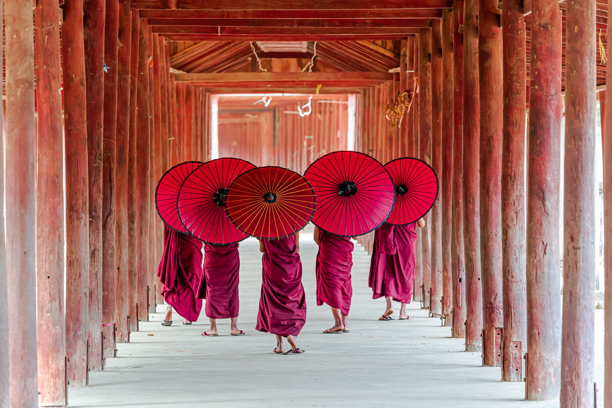 Novices monk walking in old Temple