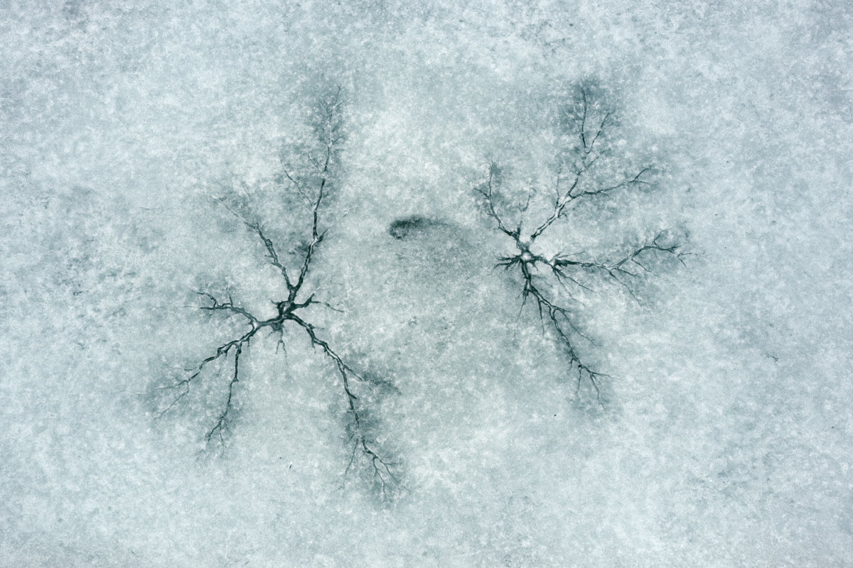 Patterns On Ice In The Lake