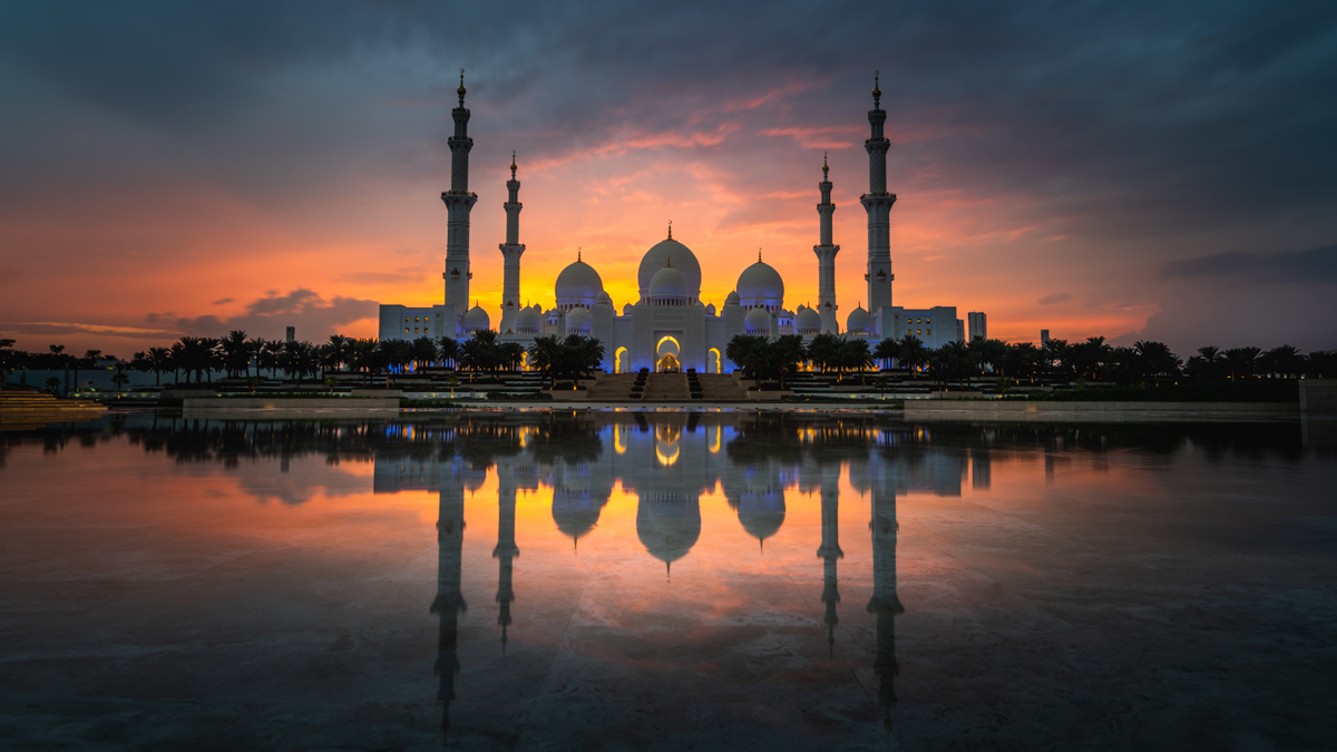 Grand Mosque, with reflection in rain puddle