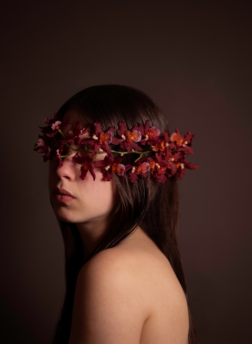 Girl with red orchid