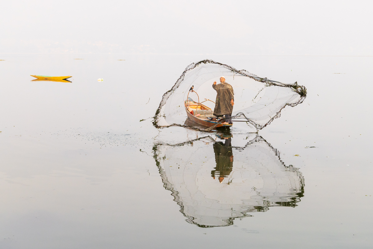 Fisherman Tossing His Net