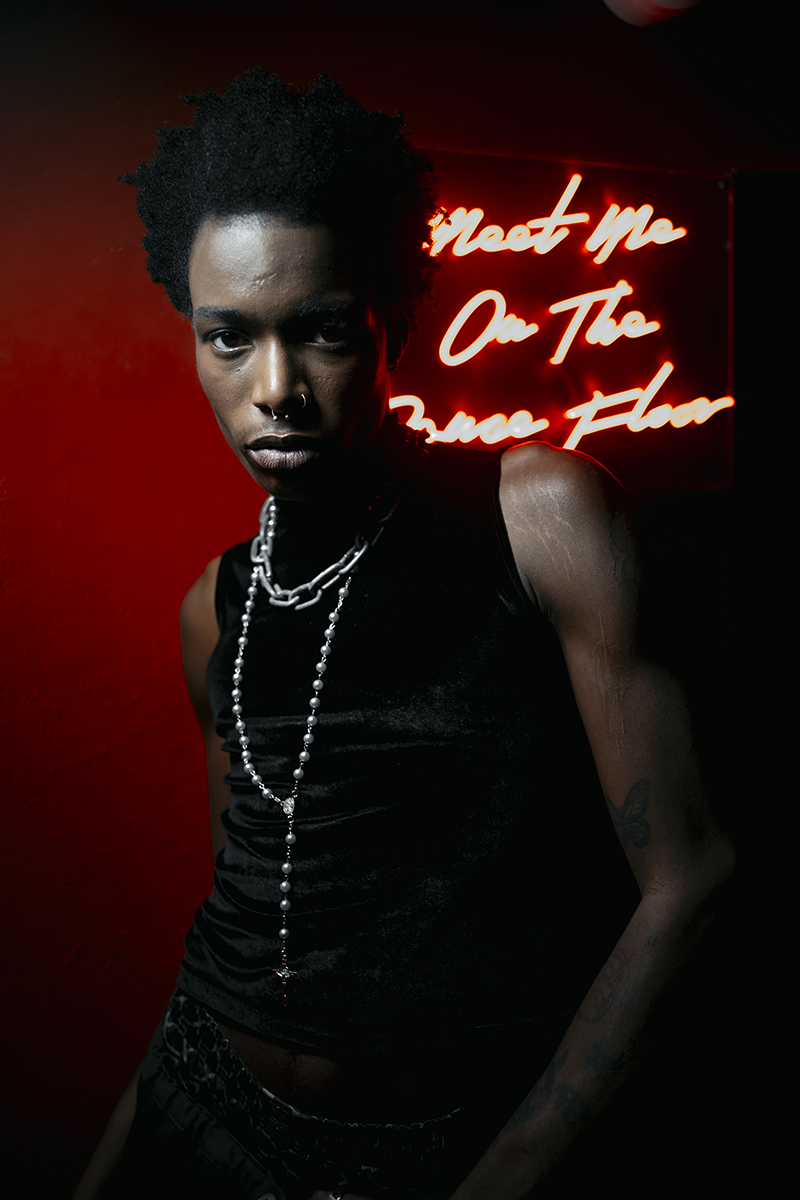 Portraits of man in nightclub corridor in Madrid