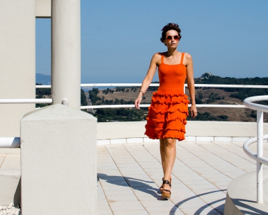 Cristina with Orange Dress