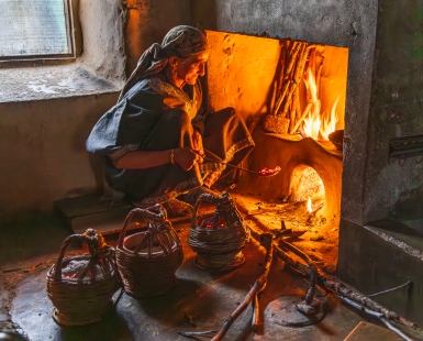 Woman Preparing Kashmiri Kangri Hot Coal Baskets