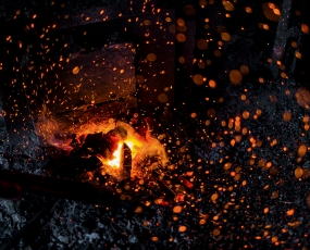  Peja/Peć, Kosovo. In a workshop of a blacksmith the fire is turned on for metalworking. 