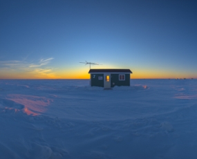 Ice Fishing House at Sunset
